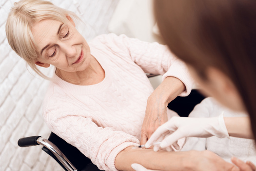 AARP Nevada is asking the state to ensure that nursing homes make public their rate of vaccinations for staff and residents. (Freeograph/Adobestock)