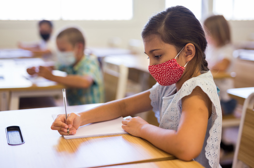 In a new survey, 65% of parents said they think low teacher pay is a cause for concern. (JackF/Adobe Stock)