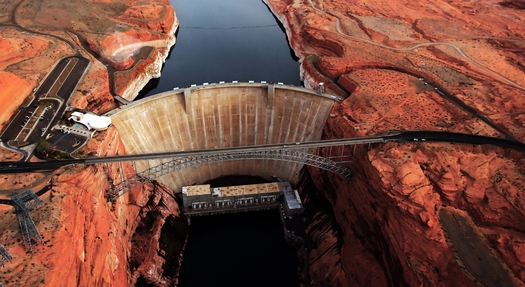 Glen Canyon Dam is 710 feet tall and impounds the Colorado River to form the 26-million-acre-foot Lake Powell reservoir. (shuvro ghose/Adobe Stock)