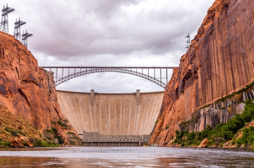Glen Canyon Dam is 710 feet tall and impounds the Colorado River to form the 26-million-acre-foot Lake Powell reservoir. (mariakray/Adobe Stock)