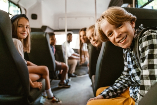 Many Arizona public school districts may have to cut back or eliminate transportation or other programs if state legislators force year-end budget cuts. (Drobot Dean/Adobe Stock)