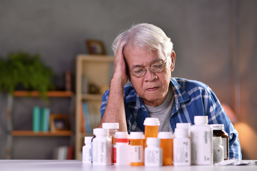 More than half of Massachusetts residents making less than $100,000 a year are somewhat or very worried about affording prescription drugs. (amenic181/Adobe Stock)