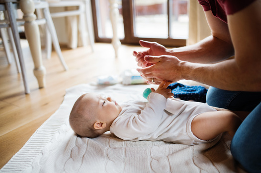 Under the federal Family and Medical Leave Act, unpaid leave is inaccessible for 56% of working residents. (Adobe Stock)