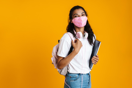 The California Department of Public Health's new mask guidance still recommends masks for the unvaccinated indoors at school settings, but does not require them. (Drubot Dean/Adobe Stock)