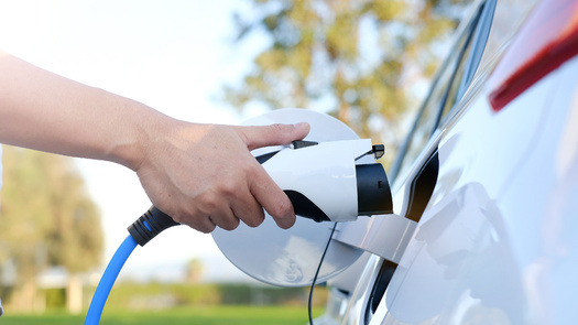 There are more than 200,000 jobs in the auto industry in Michigan, and a new report says building more electric vehicle-charging stations would create more. (paulynn/Adobe Stock)