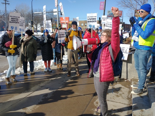 Minneapolis public school teachers and support staff picket outside district headquarters. It's the city's first teachers strike in more than 50 years. (Mike Moen/Public News Service)