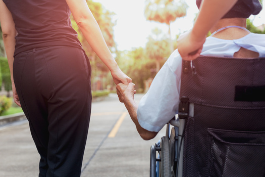 Eight in 10 Nebraska voters support increasing funding for the respite care program which provides short-term help from a home health aide or adult day-care program so family caregivers can take a break. (Adobe Stock)<br />