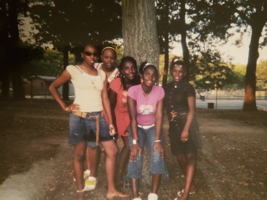 Breonna Taylor, second from left, is pictured with three of her sisters and a cousin. (De'Andrea Taylor)