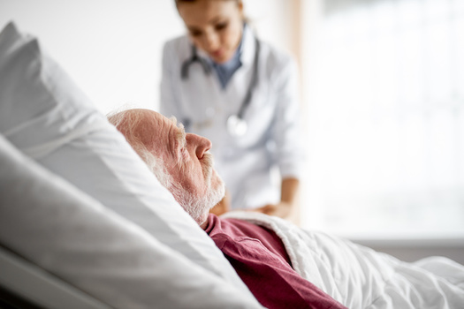 Geriatric medicine physicians in the Commonwealth say they're seeing more terminally ill patients travel out of state to receive medical aid-in-dying services. (Adobe Stock)