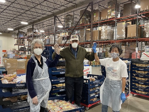 Geneva Ortiz, Tom Elmhorst and Mildred Griffee sort surplus bread as weekly volunteers for Albuquerque's Roadrunner Food Bank. (courtesy photo: rrfb)