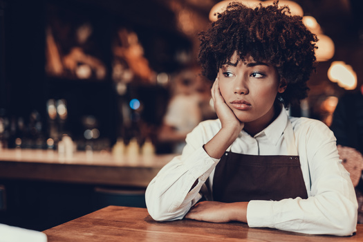 In a new national survey, 57% of women and 63% of women of color said they're considering quitting their hospitality-industry jobs because of worsening harassment and wage theft. (Adobe Stock)