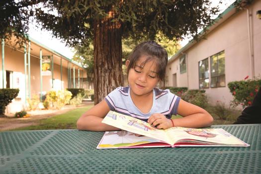 A child reads during one of Save the Children's after-school programs in Central Valley California. (Tamar Levine/Save the Children)