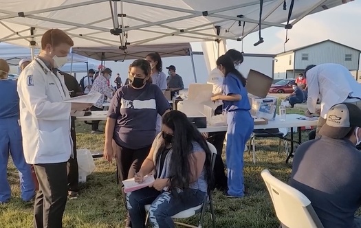 Staff prepare to vaccinate North Carolina residents at a pop-up clinic run by the Farm Labor Organizing Committee, AFL-CIO. (Christiana Wagner/FLOC)