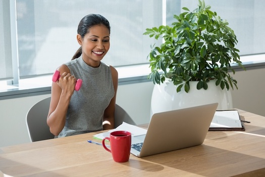 Onsite fitness centers can improve employees' well-being, productivity, engagement and retention, according to the American Heart Association. (Adobe stock)