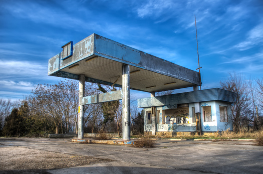 Examples of brownfield sites include an out-of-business gas station, or an old dry-cleaning business which may have disposed chemical solvents down the drain, contaminating the groundwater. (Adobe Stock)