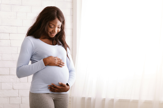 Doulas are trained to provide physical, emotional and informational support to pregnant people during labor, birth and postpartum. (Adobe Stock)