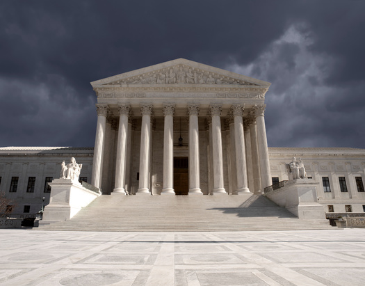 In a blow to the nation's efforts to curb climate change, the U.S. Supreme Court has reduced the Environmental Protection Agency's power in regulating emissions from existing power plants. (Adobe Stock)