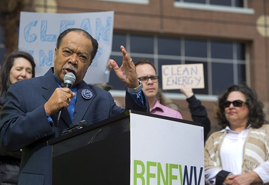 The Rev. Leonard Jackson speaks at a clean-energy rally in 2017. His Faith Organizing Alliance says the Juneteenth message of freedom can also be helpful in motivating people to work toward curbing climate change. (Steve Marcus)