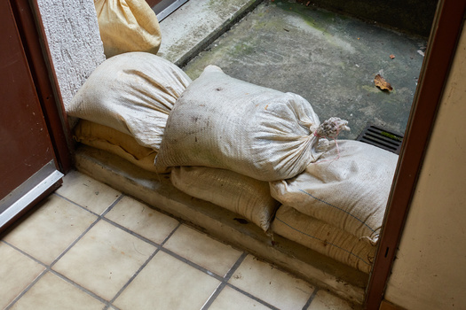 Sandbags can be used to reduce flood damage. Most home insurance policies in Pennsylvania do not include flood insurance. (Jan/Adobe Stock)