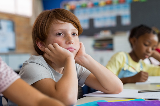 A new report finds Ohio school districts in metropolitan or urban areas have experienced a 27.7% increase in chronic absenteeism in recent school years. (Adobe Stock)