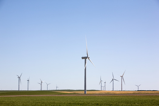 The Inflation Reduction Act includes tax credits for renewable energy, such as wind turbines. (Yay Images/Adobe Stock)