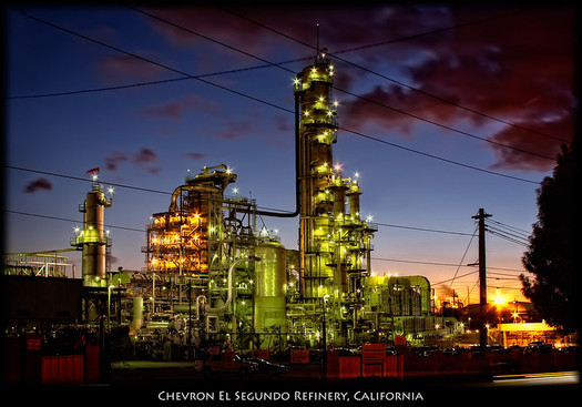 Multi-billion-dollar companies like Chevron, which owns this refinery in El Segundo, would have to track and make public their carbon emissions if SB 260 becomes law. (Pedro Szekely/Flickr)