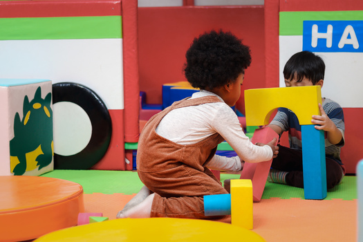 Supporters of boosting wages for childcare workers in North Dakota say low pay is fueling the lack of available care. They say some families report traveling 80 miles roundtrip to bring their children to a provider. (Adobe Stock)
