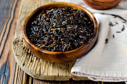 Not only has inflation created more economic gaps in tribal areas, food experts say it also has sent the cost of things like wild rice soaring. And that has limited access to these staples for Natives living in larger cities, too. (Adobe Stock)