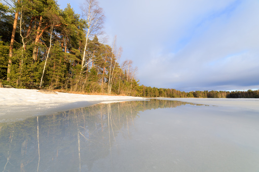 Authors of a new study predict lakes in the Northern Hemisphere will eventually lose their frozen surface between 15 and 45 days earlier as climate change worsens. (Adobe Stock)