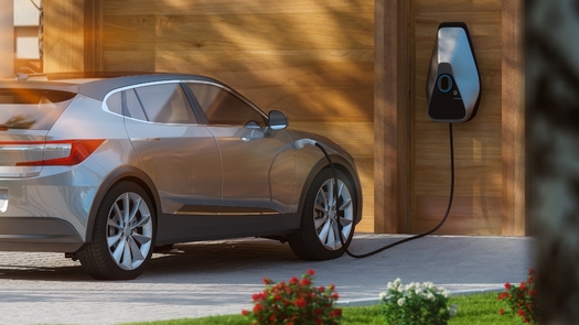 The energy industry reports a transition to 100% electric vehicle sales and a clean electricity grid by 2035 could save consumers $2.7 trillion. (Herr Loeffler/Adobe Stock)