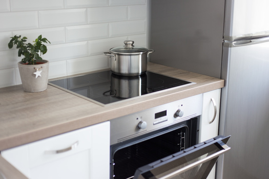 Electric ranges have been shown to emit fewer toxic chemicals than gas stoves. (Di Studio/Adobe Stock)