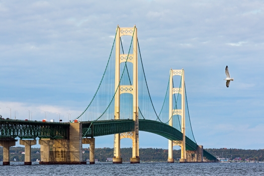 The 26,000-foot Mackinac Bridge runs over the Straits of Mackinac, connecting Michigan's Upper Peninsula with the main part of the state. (Kenneth Kiefer/Adobe Stock)