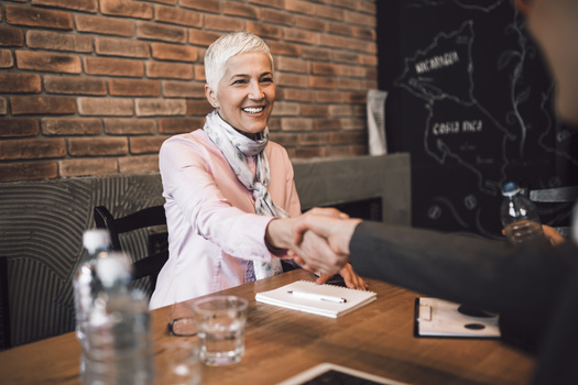 A program that helps older folks find work connects people with a host agency for about 20 hours a week of paid job training. (hedgehog94/Adobe Stock)