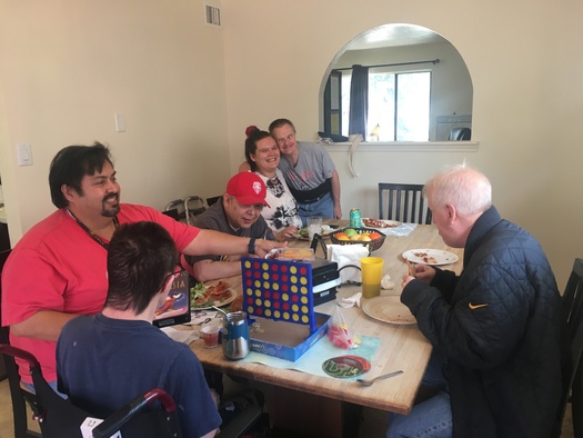 Direct support professionals enjoy recreational time with participants in program for people with developmental disabilities in Albuquerque. (Michele McCoy/ARCA)