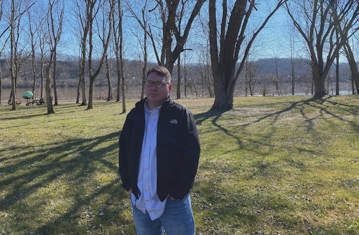 Chris Powers stands in front of the Land Bank lot that he tried to bid on in Southern Ohio. (Eye on Ohio)