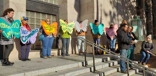 Homero Jose speaks to a crowd gathered at Bellingham City Hall in support of a center that would serve the community's immigrant populations. (Brenda Bentley)