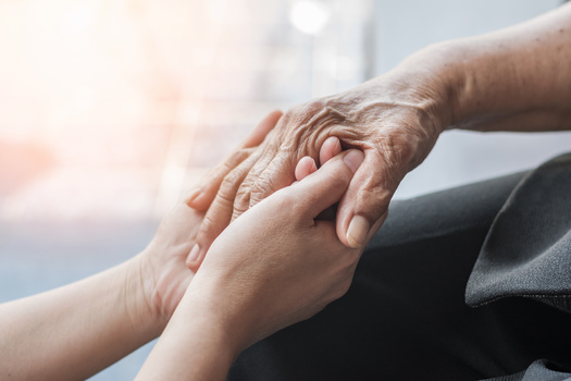 More than 40 million Americans provide unpaid caregiving work to a loved one. (Chinnapong/Adobe Stock)