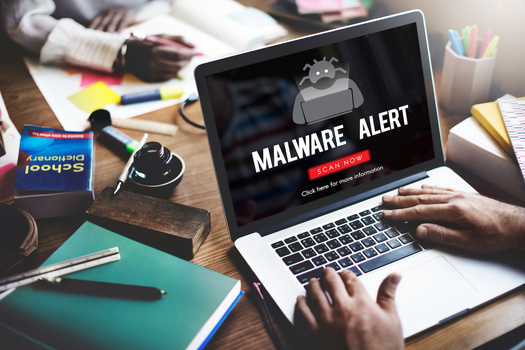 Some online scams launch pop-up windows claiming to have discovered a virus in your computer, tablet or smartphone, in an effort to launch malware that can take over your device's operating system. (Adobe Stock)