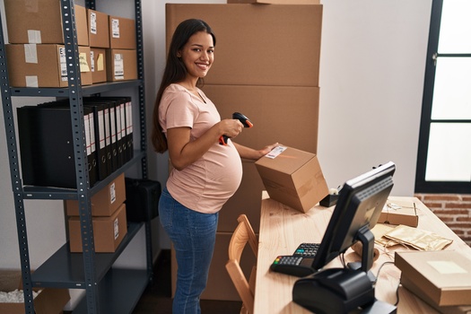 A national advocacy group says three-quarters of women in the United States who are entering the workforce will be pregnant and employed at some point of their lives. (Adobe Stock)