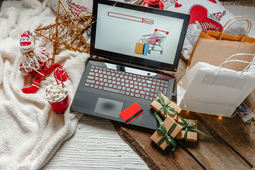 Two-thirds of people surveyed by the AARP Fraud Watch Network said they shopped online last year, and 21% said they planned to shop online again this holiday season. (Shintartanya/Adobe Stock)