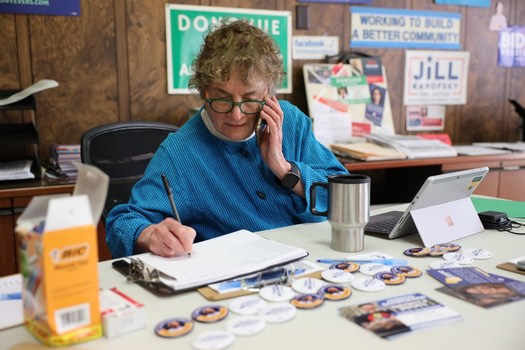 Mary Lynne Donohue, co-chair of the Sheboygan County Democratic Party, speaks with Sheboygan City Clerk Meredith DeBruin on Nov. 8 at Democratic Party headquarters in Sheboygan. (Coburn Dukehart / Wisconsin Watch)