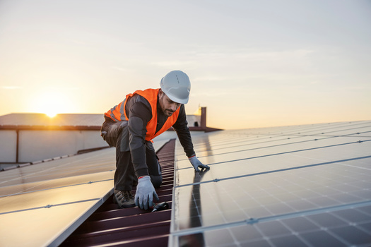 According to the Interstate Renewable Energy Council, there were 255,037 workers in the solar industry across the U.S. in 2021, which represents a 9.2% increase from 2020. (Adobe Stock)