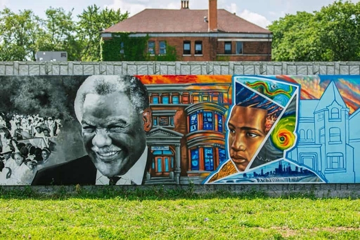 Storage batteries hidden behind this Bronzeville mural will be part of a microgrid system that will render the entire Chicago neighborhood energy-independent. (ComEd)