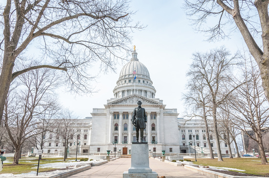 Campaign contributions, fueled by out-of-state donors, are expected to shatter records for the Wisconsin Supreme Court race. The top two vote-getters in this month's primary will go on to the April election. (Adobe Stock)