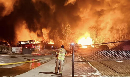 Train cars containing hazardous chemicals burned after a Feb. 3 derailment in East Palestine, Ohio. (Jamie Cozza)