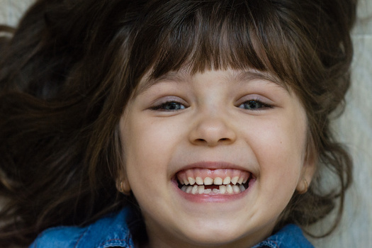Children aged 5 to 19 from low-income families are twice as likely to have cavities, compared with children from higher-income households, according to the Centers for Disease Control and Prevention. (Adobe Stock)