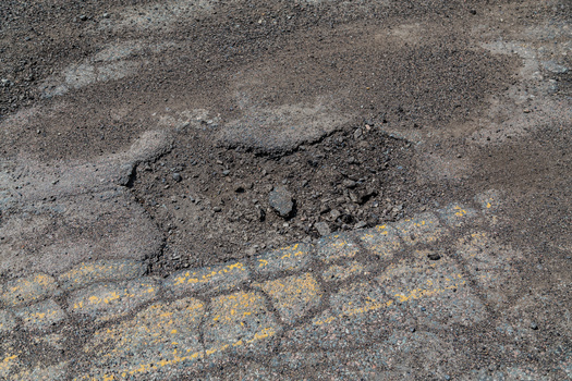 Groups calling for more transportation-related investments in Minnesota say not only would more funding create more jobs and help the state's economy, it also would help to keep motorists safe. (Adobe Stock)