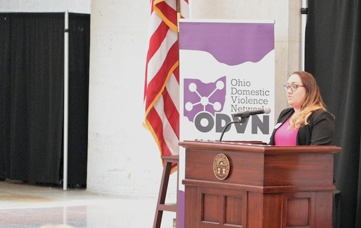 Ohio Domestic Violence Network Policy Director Maria York addresses legislators, domestic violence advocates and news media at the Ohio Statehouse during a recent Advocacy Day event. (Ohio Domestic Violence Network)