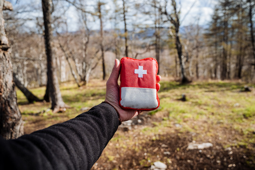 In addition to first aid kits, the American Red Cross suggests having extra clothes, rain gear and sturdy shoes that are accessible when venturing into the outdoors for a lengthy period. (Adobe Stock)