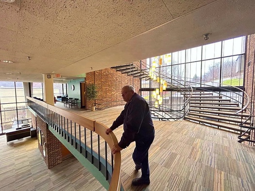 Montgomery Mayor Greg Ingram looks out over the old library of WVU Tech, which the city is slowly attempting to repurpose. (Photo/Nick Fouriezos)